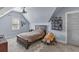 Bedroom with sloped ceilings featuring carpeted floor and natural lighting at 5178 Stefan Ridge Way, Buford, GA 30519
