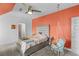 Bright bedroom featuring a unique hanging chair, plush carpet, and neutral accents at 5178 Stefan Ridge Way, Buford, GA 30519
