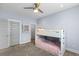Light blue bedroom with bunkbeds and grey trim at 5178 Stefan Ridge Way, Buford, GA 30519