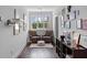 Cozy sitting area with two leather chairs and eclectic wall art at 5178 Stefan Ridge Way, Buford, GA 30519