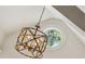 Unique chandelier fixture complementing the architectural details of the room at 5251 Powers Ferry Rd, Atlanta, GA 30327