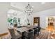 Elegant dining room showcasing open floor plan with a view to the living area at 5251 Powers Ferry Rd, Atlanta, GA 30327