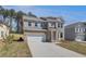 Attractive two-story brick home offers a spacious driveway and manicured front yard at 623 Leafy Branch Way, Mcdonough, GA 30253
