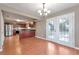 Open floor plan showcases a kitchen with stainless steel appliances, dining area and access to back yard at 912 Third St, Stone Mountain, GA 30083