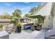 Outdoor deck with a dining table and umbrella, perfect for entertaining at 1068 Shelby Se Pl, Atlanta, GA 30316