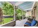 A spacious covered front porch offers an inviting outdoor living space with comfortable seating at 1068 Shelby Se Pl, Atlanta, GA 30316