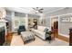 Inviting living room with a fireplace, stylish furnishings, and hardwood flooring at 1068 Shelby Se Pl, Atlanta, GA 30316