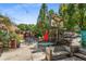Inviting outdoor seating area with tables and umbrellas, perfect for enjoying the fresh air and sunshine at 1068 Shelby Se Pl, Atlanta, GA 30316