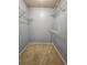 Empty walk-in closet with ample storage space and neutral carpet at 10900 Wittenridge Dr # H8, Alpharetta, GA 30022