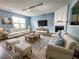 Spacious living room with two sofas, a fireplace and lots of seating at 10900 Wittenridge Dr # H8, Alpharetta, GA 30022