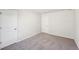 Bedroom featuring two closets for ample storage space at 11850 Rizvan Pl, Covington, GA 30014