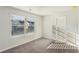 Bedroom with large window allowing natural light and views at 11850 Rizvan Pl, Covington, GA 30014