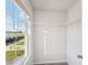 Walk-in closet with a window, providing natural light and shelving at 11850 Rizvan Pl, Covington, GA 30014