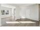 Versatile room showing natural light, neutral paint, and hard surface floors at 11850 Rizvan Pl, Covington, GA 30014