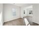 Sun-filled flex room perfect for an office, featuring wood floors and natural lighting at 11850 Rizvan Pl, Covington, GA 30014