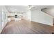 Spacious living room featuring an open floor plan and views into the modern kitchen at 11850 Rizvan Pl, Covington, GA 30014