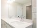 Bathroom with double vanity, quartz counters, and large mirror at 1624 Ruskin Way, Marietta, GA 30062