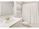 Well-lit bathroom with clean white fixtures, modern vanity, and shower-tub combination at 42 Citrine Way, Acworth, GA 30101