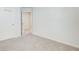 Bright bedroom features neutral walls and plush carpeting, creating a cozy, inviting space at 42 Citrine Way, Acworth, GA 30101