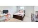 Bedroom with cozy bed, desk, and a dresser perfect for a  at 42 Citrine Way, Acworth, GA 30101
