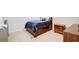 Bedroom with a bed featuring storage drawers below at 42 Citrine Way, Acworth, GA 30101