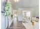 Elegant foyer with wood floors, stylish console table, and an inviting view into the living area at 42 Citrine Way, Acworth, GA 30101