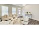 Bright living room with stylish furniture, decorative accents, and ample natural light at 42 Citrine Way, Acworth, GA 30101