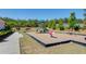 Community playground features play structures, a walking path, and landscaping at 42 Citrine Way, Acworth, GA 30101