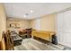 Finished basement with modern floors, storage, folding chairs, and light colored walls at 5837 Fox Run, Rex, GA 30273