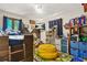 Fun bedroom with bunk, ladder, decor, shelves, and beanbag chair at 5837 Fox Run, Rex, GA 30273