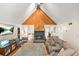 Inviting living room with a stone fireplace, vaulted ceilings, and plush furnishings at 5837 Fox Run, Rex, GA 30273