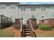 View of the decks with stairs in the backyard at 105 Odyssey Turn, Conyers, GA 30012
