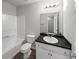 Bathroom featuring a shower/tub combo and a neutral color palette at 105 Odyssey Turn, Conyers, GA 30012