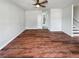 Spacious living room featuring wood-look floors and neutral paint at 105 Odyssey Turn, Conyers, GA 30012