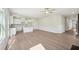 Spacious living area showcasing an open kitchen layout, modern finishes, and plentiful light at 11854 Rizvan Pl, Covington, GA 30014