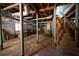 Unfinished basement with concrete walls, wooden beams, and utility features at 1398 Christmas Ne Ln, Atlanta, GA 30329