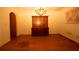 Dining room with hardwood floors and a large wooden hutch, illuminated by a chandelier at 1398 Christmas Ne Ln, Atlanta, GA 30329