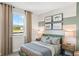 Cozy bedroom with natural light, and stylish decor at 244 Nesta Grove, Locust Grove, GA 30248