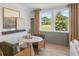 Cozy breakfast nook with large windows and modern decor at 244 Nesta Grove, Locust Grove, GA 30248