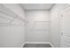 Spacious walk-in closet with wire shelving and ample storage space at 244 Nesta Grove, Locust Grove, GA 30248