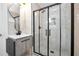 Contemporary bathroom featuring a glass shower and a modern vanity at 3355 Wesley Chapel Rd, Decatur, GA 30034