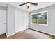 Bedroom featuring a window, closet, and vinyl wood flooring at 3355 Wesley Chapel Rd, Decatur, GA 30034