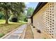 Yard features decorative gravel and modern stone pavers at 3355 Wesley Chapel Rd, Decatur, GA 30034