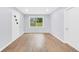 Bright, airy room with fresh paint, new wood floors, and natural light at 3355 Wesley Chapel Rd, Decatur, GA 30034