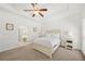 Primary bedroom with white walls, carpet, and a ceiling fan at 4044 Andover Cir, Mcdonough, GA 30252