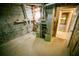 Unfinished basement space with concrete floors and exposed utilities at 4190 Heather Way, Cumming, GA 30041