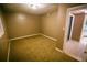 Standard bedroom with carpet, neutral wall color and an attached bathroom at 4190 Heather Way, Cumming, GA 30041
