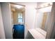 Spacious walk-in closet with ample shelving and natural light from a window at 4190 Heather Way, Cumming, GA 30041