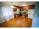 Charming kitchen with stainless steel appliances and wood cabinets at 4190 Heather Way, Cumming, GA 30041