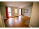 Bright living room with hardwood floors, vaulted ceiling, and large windows at 4190 Heather Way, Cumming, GA 30041